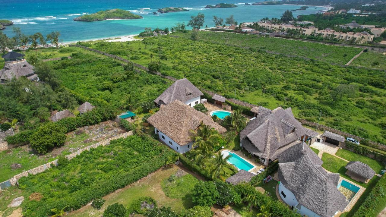 ワタム Nyumba Ya Afrika Bed & Breakfast エクステリア 写真
