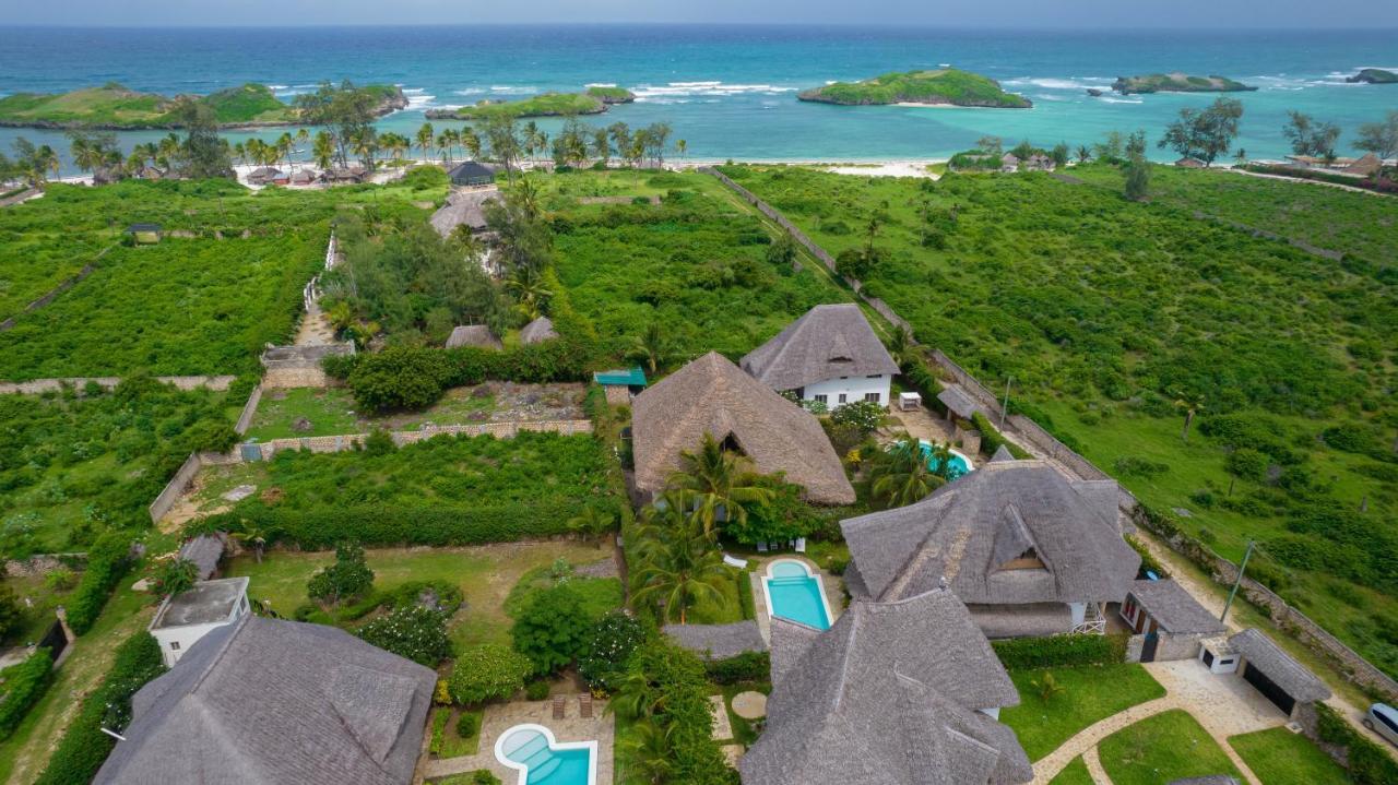 ワタム Nyumba Ya Afrika Bed & Breakfast エクステリア 写真