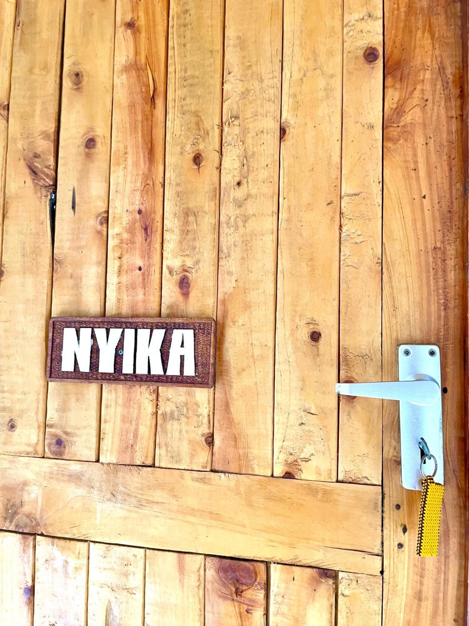 ワタム Nyumba Ya Afrika Bed & Breakfast エクステリア 写真